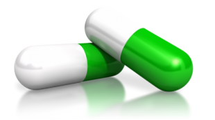 Green and white pill capsules